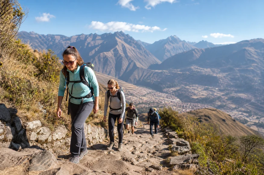 Travelers training on uphill stone steps before hiking the Inca Trail