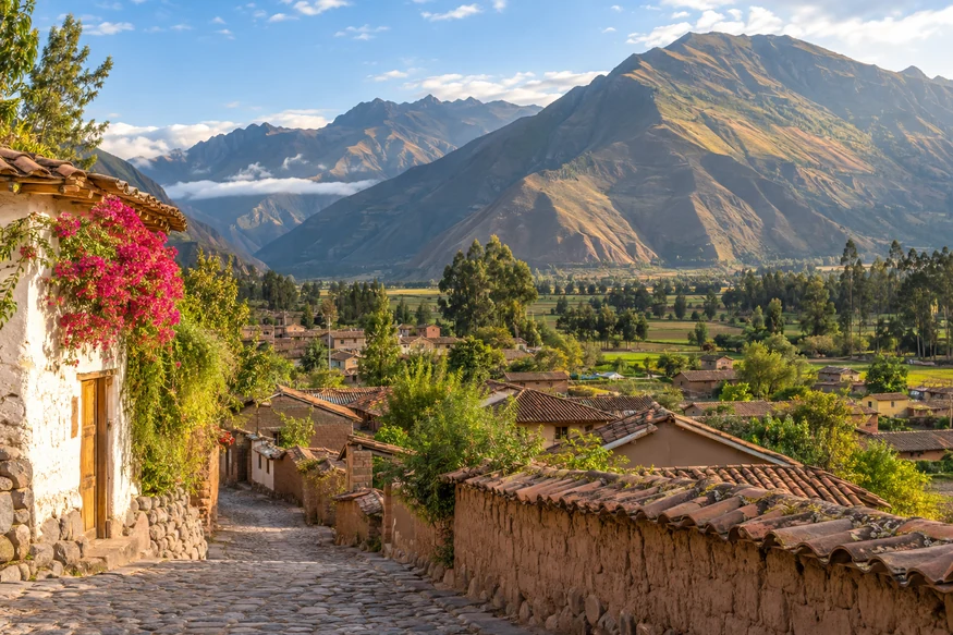 Lamay village and farmland beneath the mountains of Peru Sacred Valley