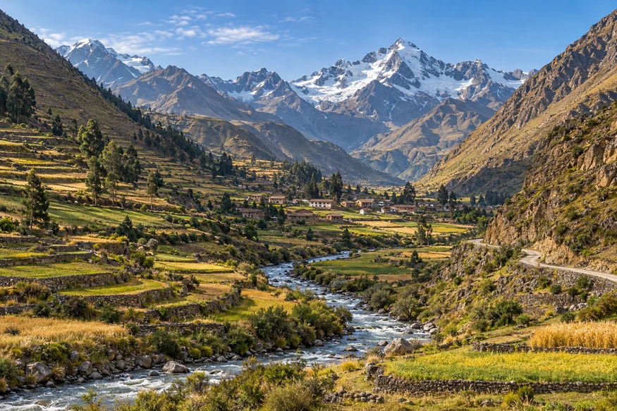 Patacancha Valley farmland river and Andean mountains near Ollantaytambo Peru