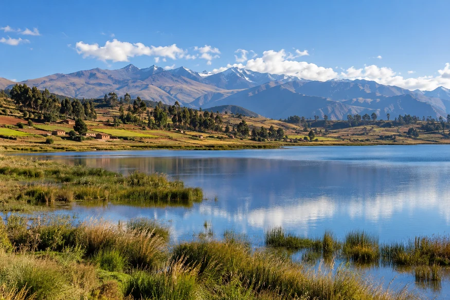 Piuray Lagoon surrounded by Andean farmland and mountains near Chinchero Cusco Peru